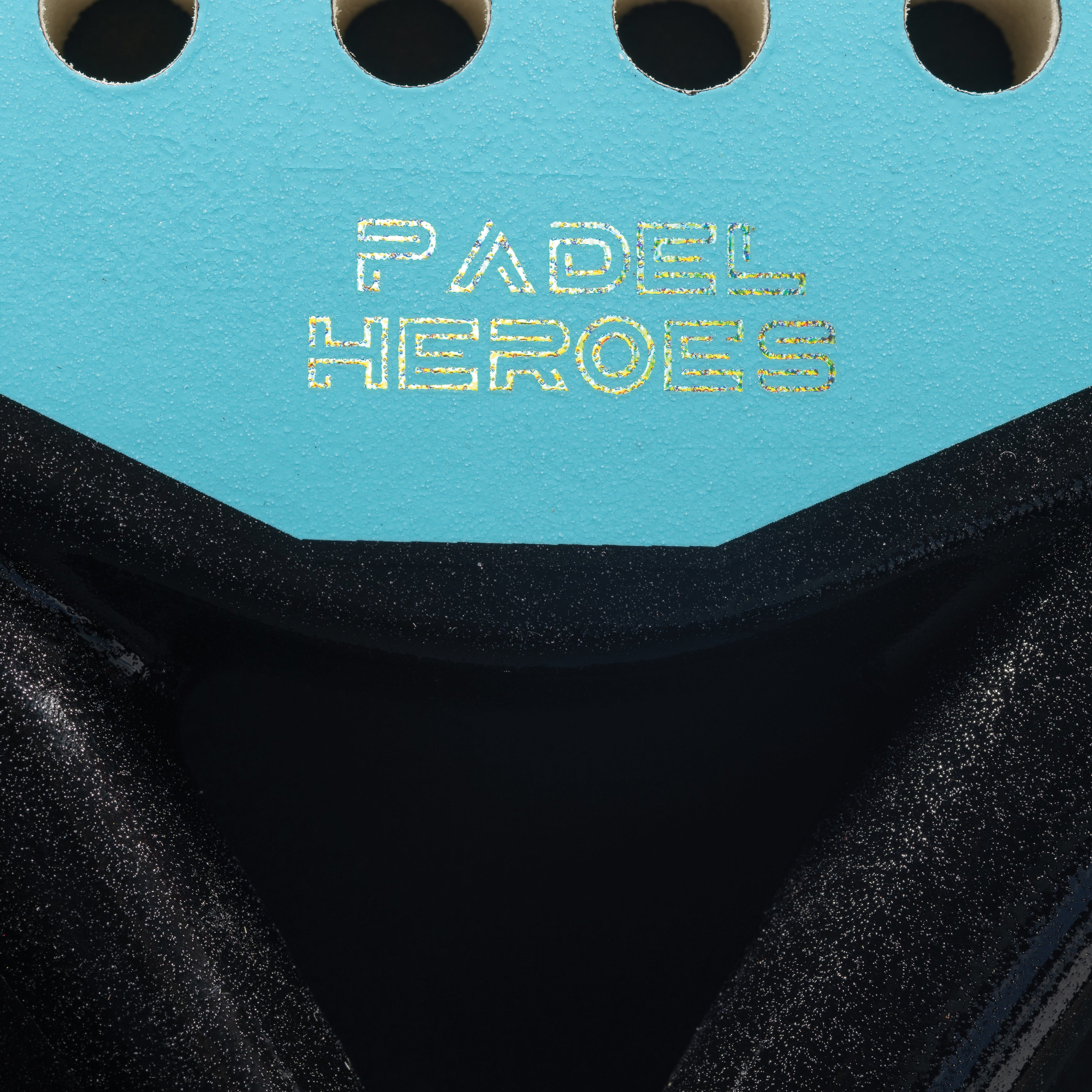 The Super Hero junior padel racket branding close-up